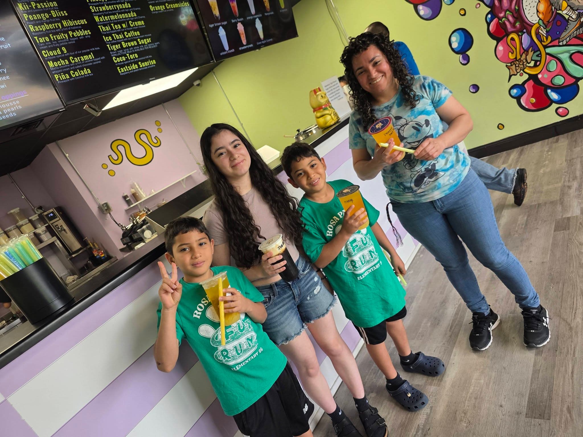 A family enjoying JBz drinks together