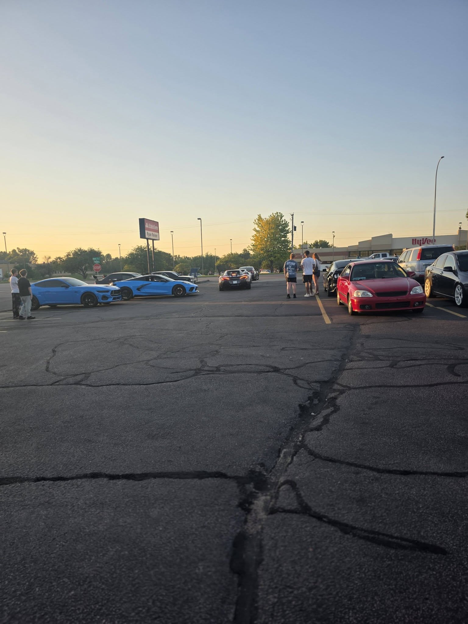 Builds parked up across the lot at golden hour for the JBz meet