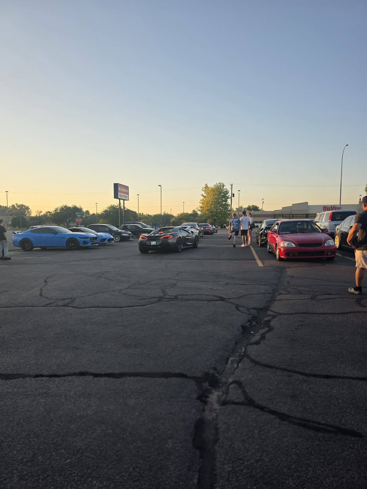 A mix of builds from exotics to street cars parked together as the sun sets at the JBz meet