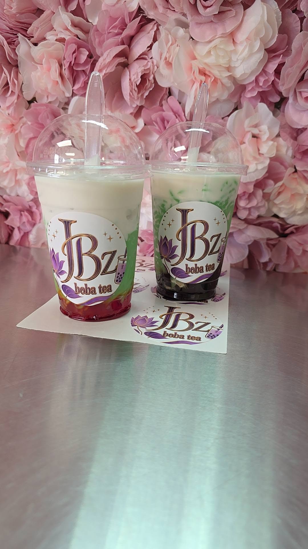 A pair of JBz drinks styled with fresh flowers
