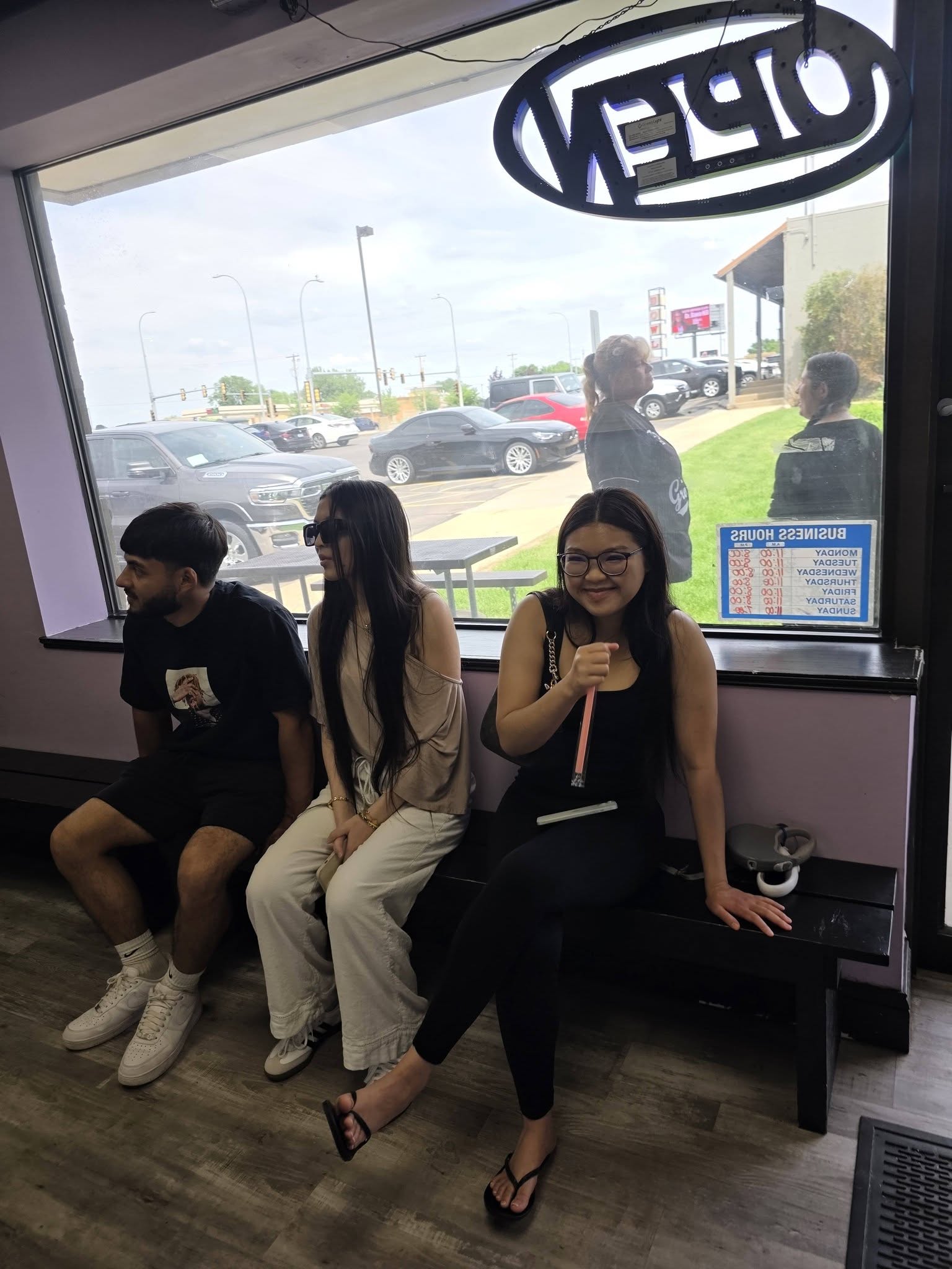 Friends hanging out in the JBz window seats